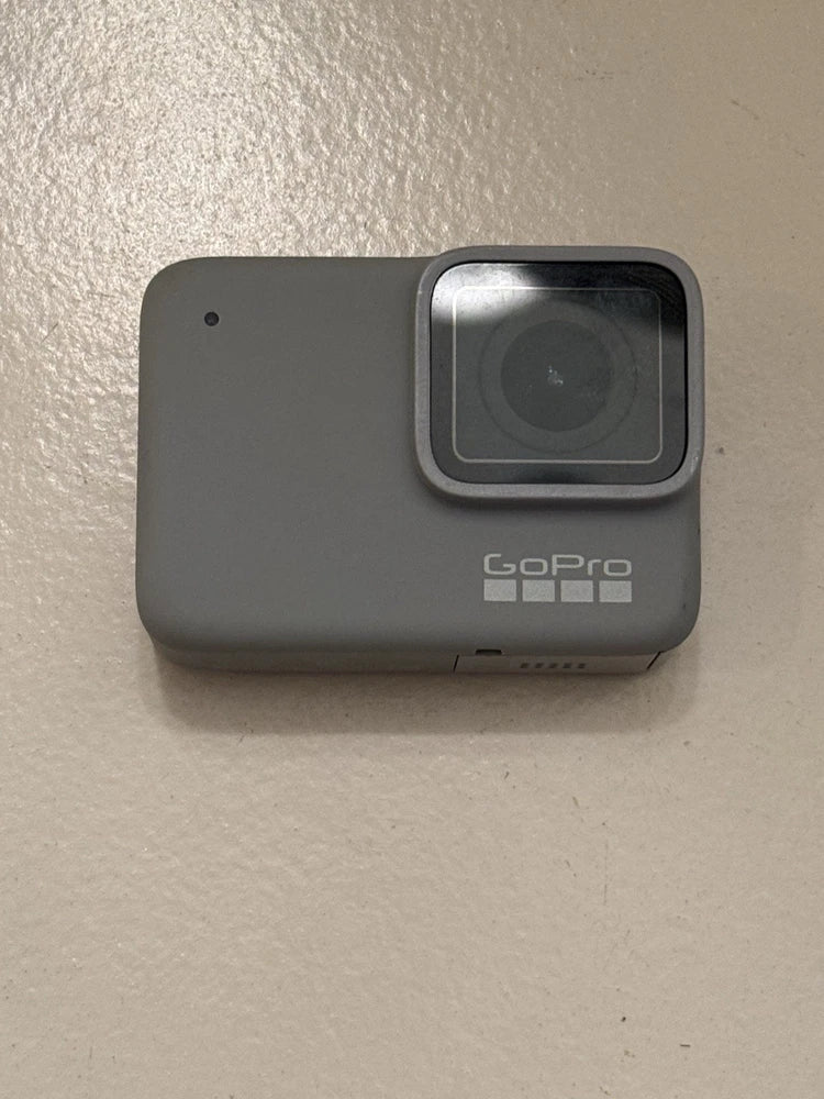 GoPro HERO7 action camera front view with lens and protective silver frame