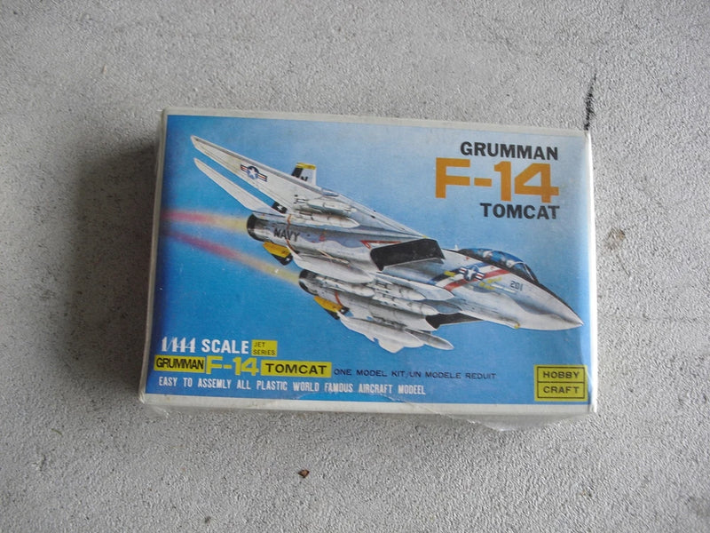 1/144 scale F-14 Tomcat model kit box with Grumman logo and aircraft artwork