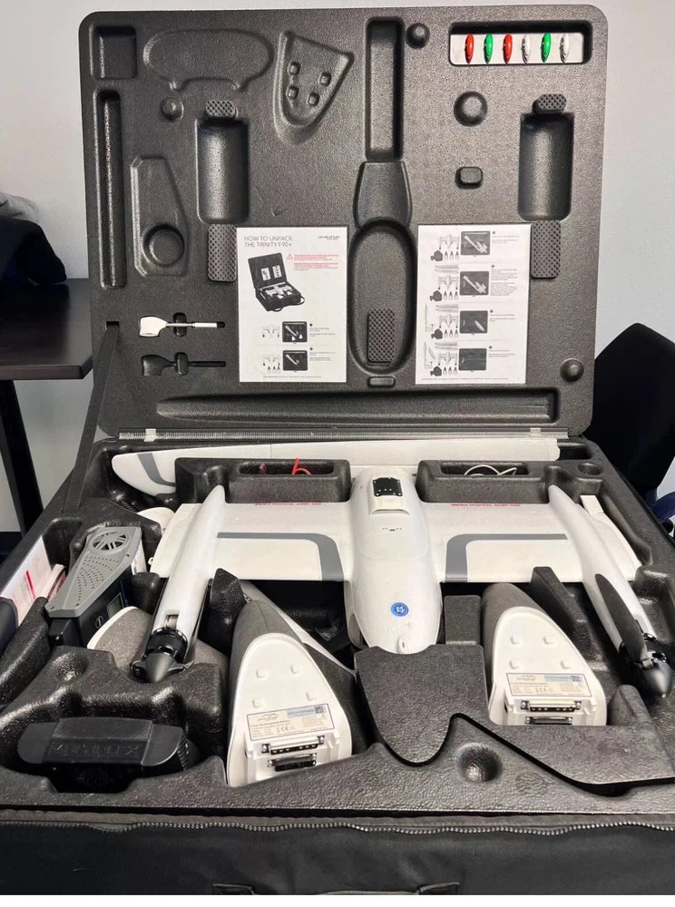 Professional drone kit with controller and five batteries in hard case