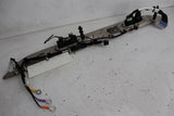 Battery pack wiring connector assembly with bracket and multi-wire plugs