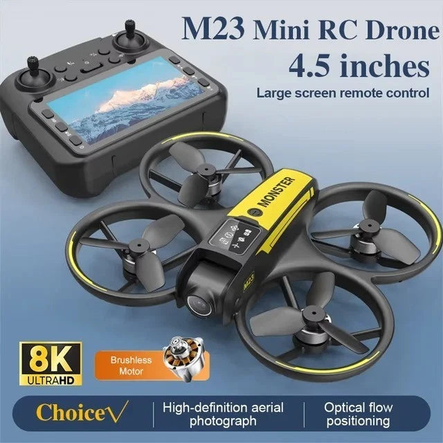 Gray mini RC drone with four propellers and yellow accents, plus handheld screen remote