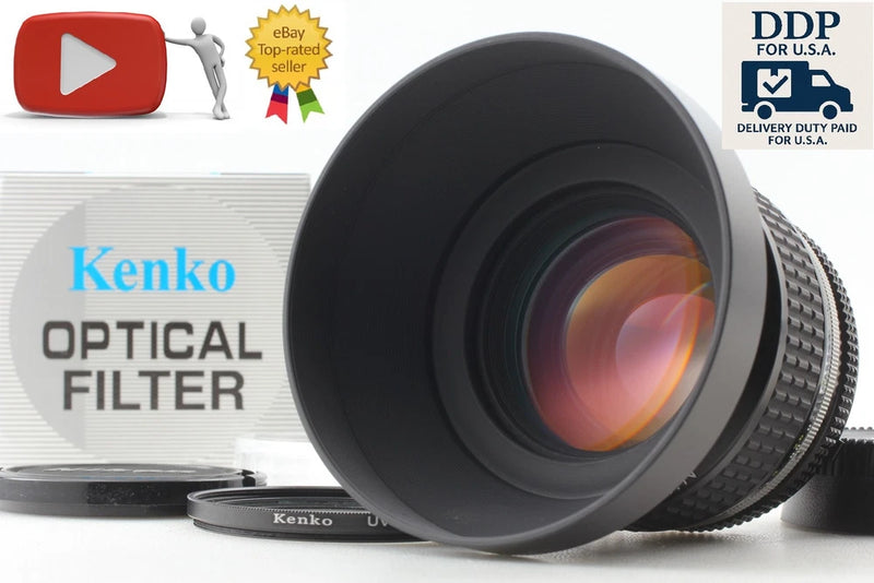Black camera lens with Kenko optical filter ring and front glass