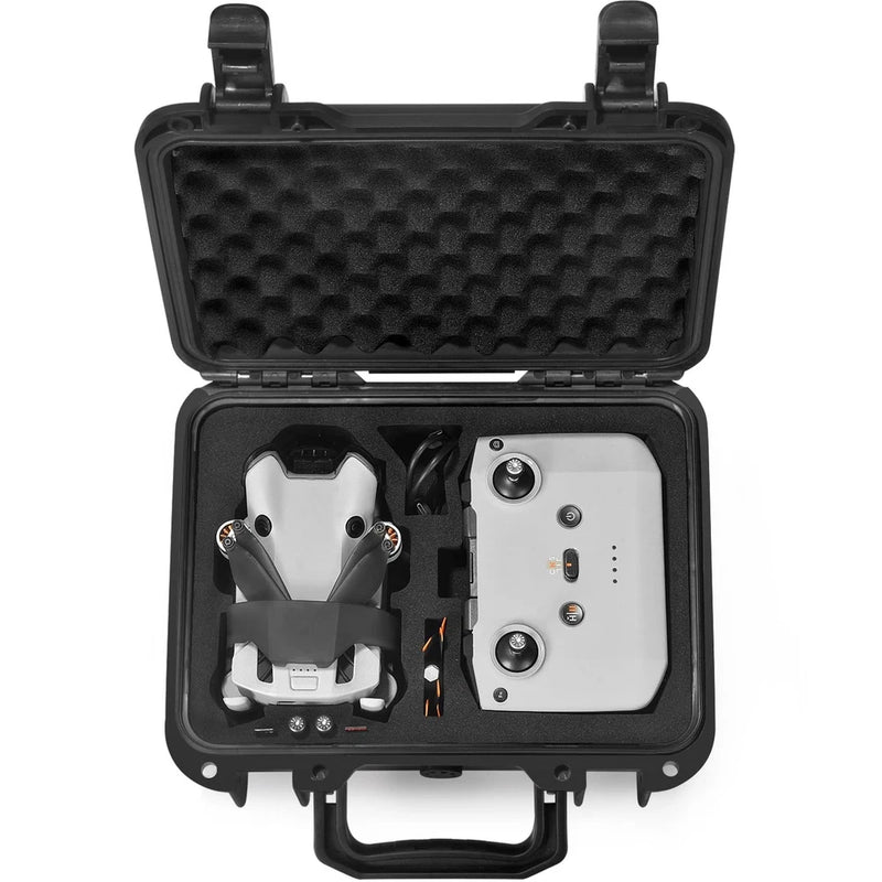 Black waterproof hard case open, foam cutout holding drone and remote controller
