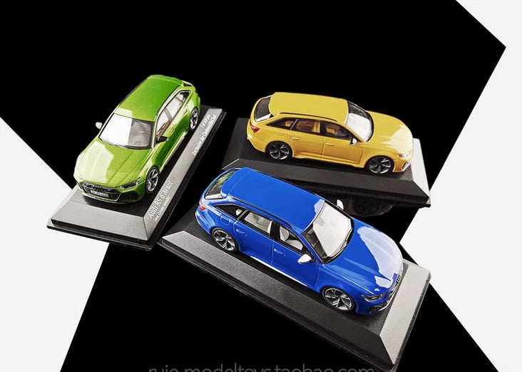 Die-cast Audi RS 6 Avant model set with three alloy cars: green, yellow, blue.