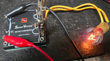 DC/DC power converter module with input/output wires, red terminal block, amber indicator