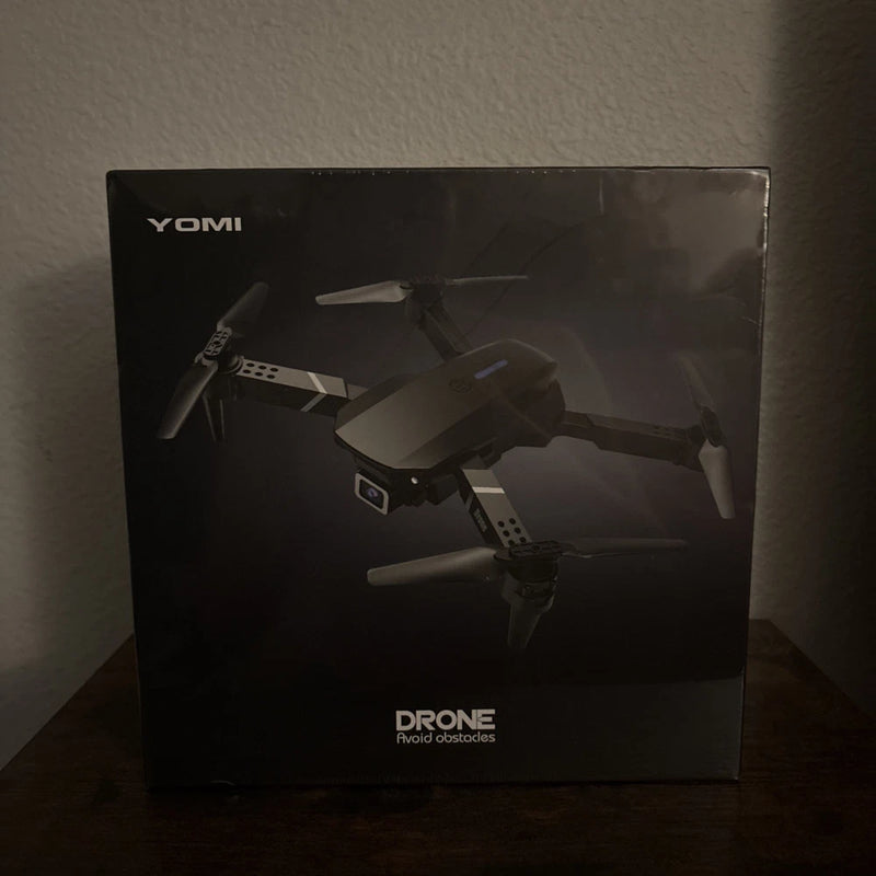 YOMI obstacle-avoidance drone retail box with drone illustration and YOMI logo