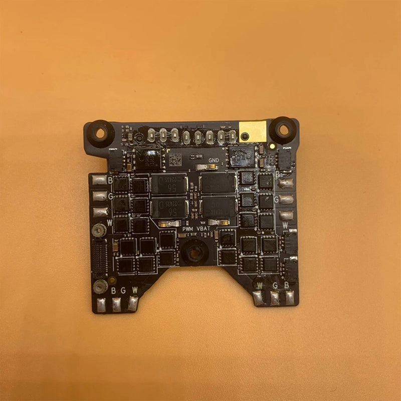 ESC board assembly for drone with circuit components and mounting screw holes