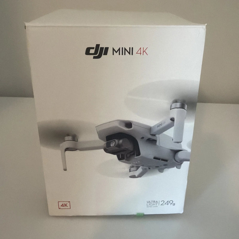 DJI Mini 4K drone packaging box with printed drone and camera specs