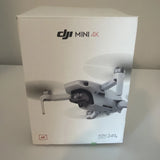 DJI Mini 4K drone packaging box with printed drone and camera specs