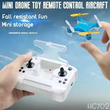 White mini RC quadcopter with four propellers and matching remote controller