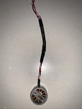 DJI drone arm motor with red/black wire, circular connector