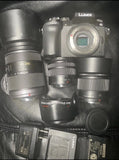 USED PANASONIC LUMIX G7 BUNDLE WITH 45-200MM 25MM 14-42 LENSES AND WITH CHARGER