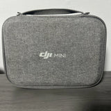 Gray DJI Mini travel case with zipper and front DJI MINI logo