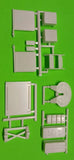 White plastic model truck battery box and mud flap parts, sprue layout