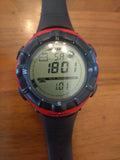 SUUNTO Vector digital outdoor watch with red bezel and black strap, digital time display