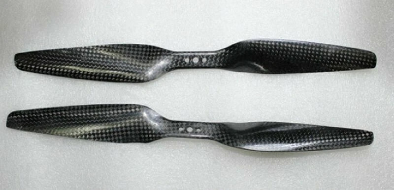 Pair of 3K carbon fiber drone propellers, textured dark blades, side-by-side
