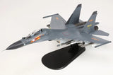 Gray fighter jet model with front landing gear and large black display stand