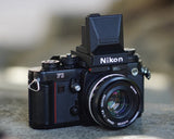 Nikon F3 camera with 3D-printed waist level view finder and magnifier attachment