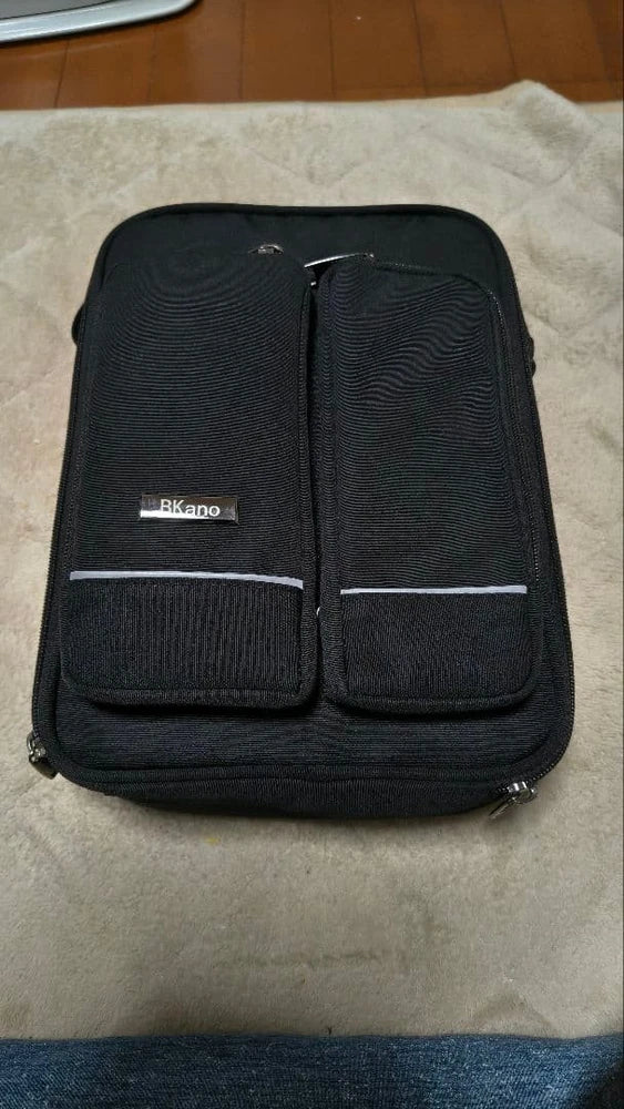 Black padded zip carry case with two front pockets for drone accessories