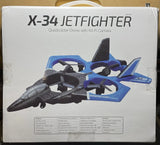 Blue and black quadcopter jet-style drone with propellers, on retail box