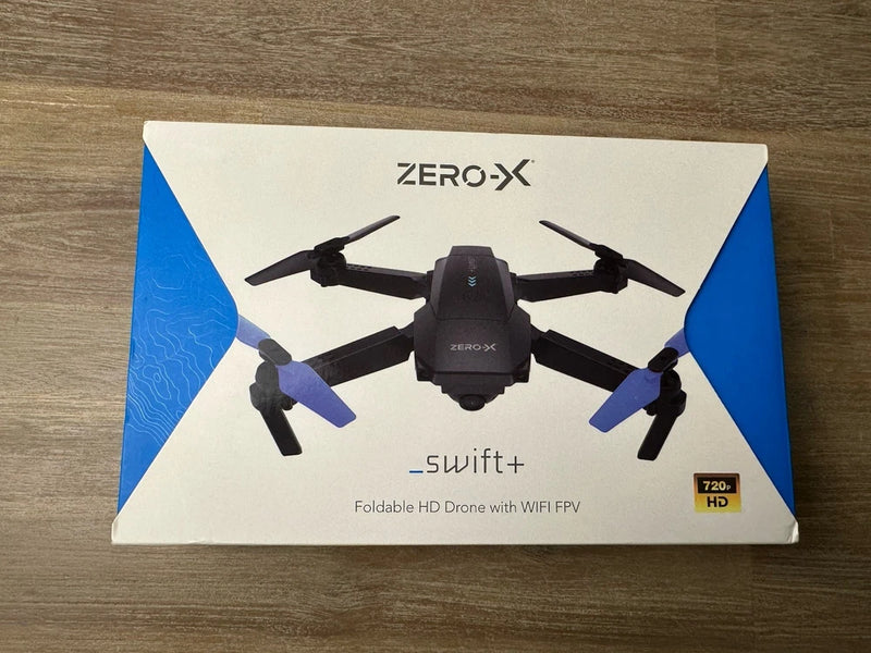 Foldable HD WiFi FPV drone box with Zero-X Swift+ quadcopter graphic