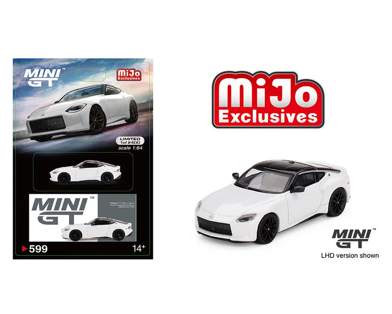 White LHD sports car die-cast model with black wheels, front 3/4 view