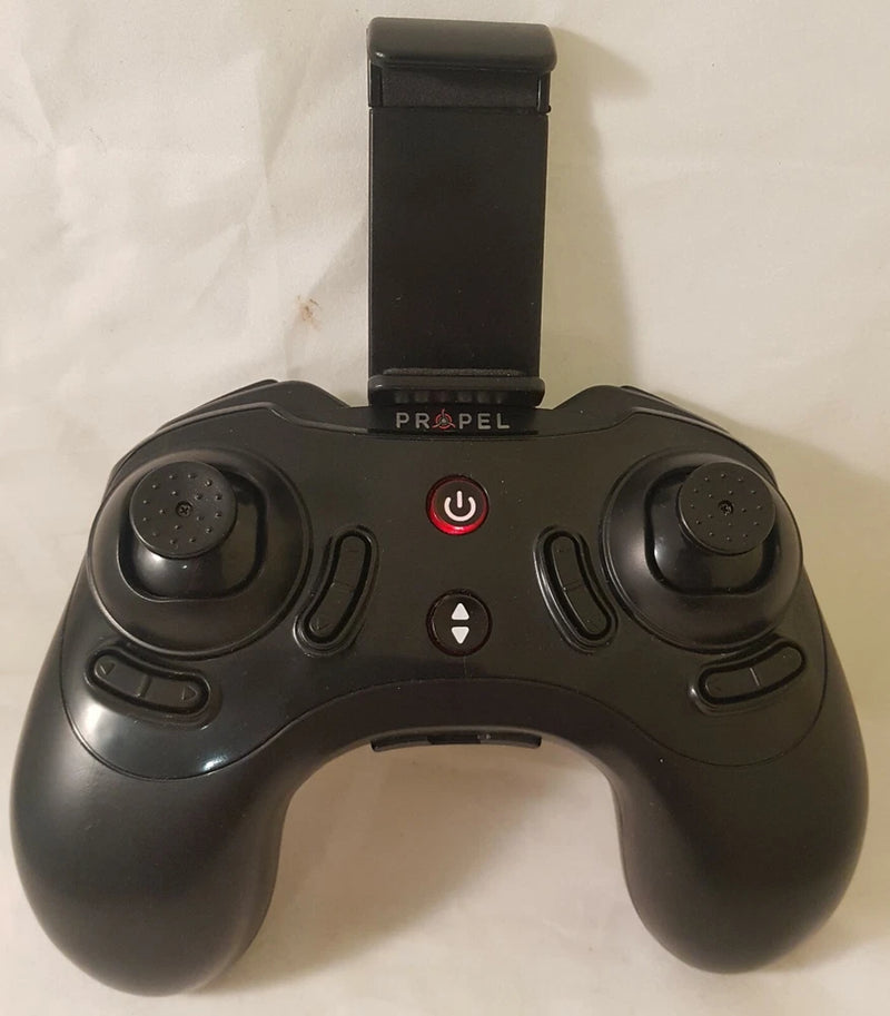 RC remote controller with two thumb sticks, black matte finish and power LED