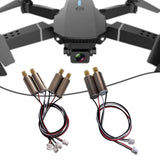 RC drone motor set with multiple motors, wires, and white connectors