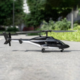 Black and silver 5CH remote control helicopter with tail rotor and landing skids