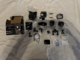 Action pro camera kit with action camera, mounts, protective case, and spare parts
