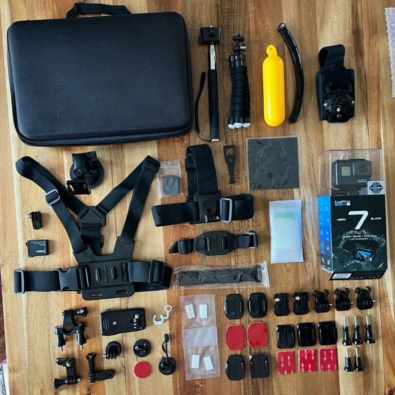 GoPro HERO7 Black action camera bundle with case, mounts, straps, and yellow float