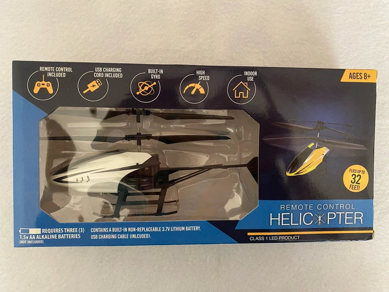 Remote control helicopter toy in sealed retail box, yellow and black, ages 8+