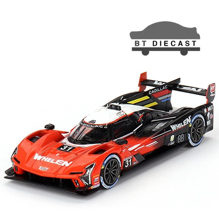 MINI GT die-cast CADILLAC race car, orange and black, number 31 WHELEN