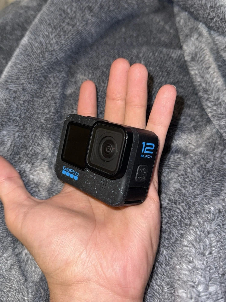 GoPro HERO12 Black waterproof action camera with front lens, LCD showing '12'