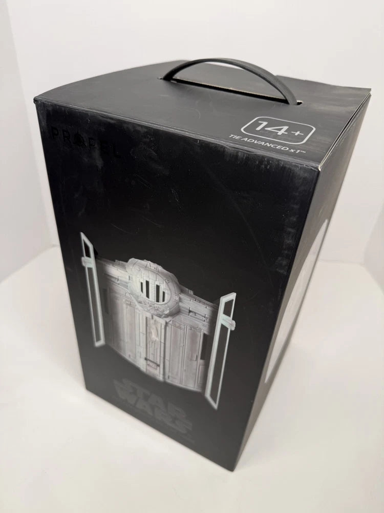 Dark quadcopter drone collectors edition box with Tie Fighter artwork and 14+ mark