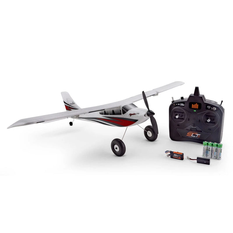 RC STOL airplane model with gray and red wing, plus black radio transmitter