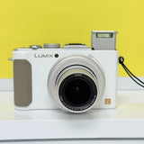 Panasonic LUMIX DMC-LX5 10.1MP 3.8X Optical Zoom Digital HD videos White English