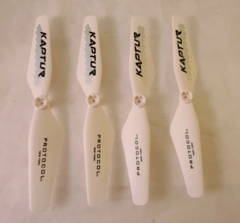Drone propeller blades set of four, white, with printed Kaptur markings