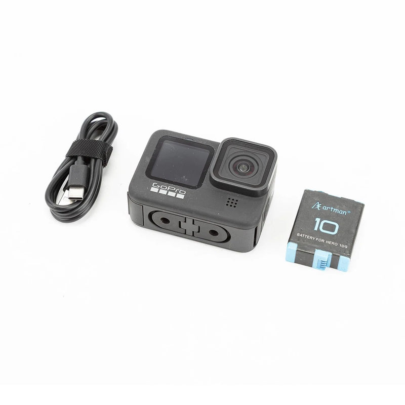 GoPro HERO9 Black action camera with charging cable and microSD memory card