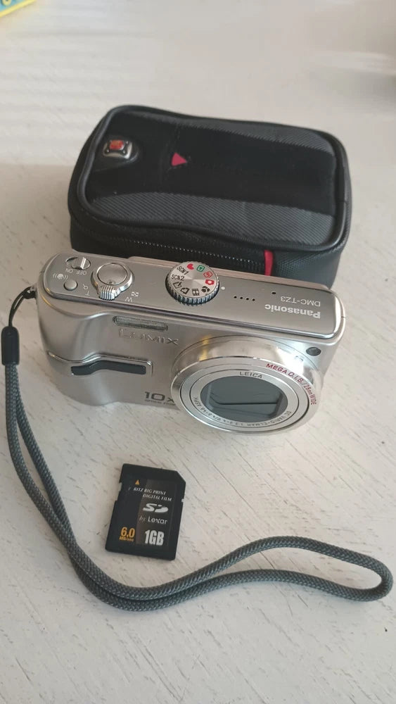 Panasonic Lumix DMC-TZ3 Digital Camera with Charger, Swiss Case, and 1GB Card