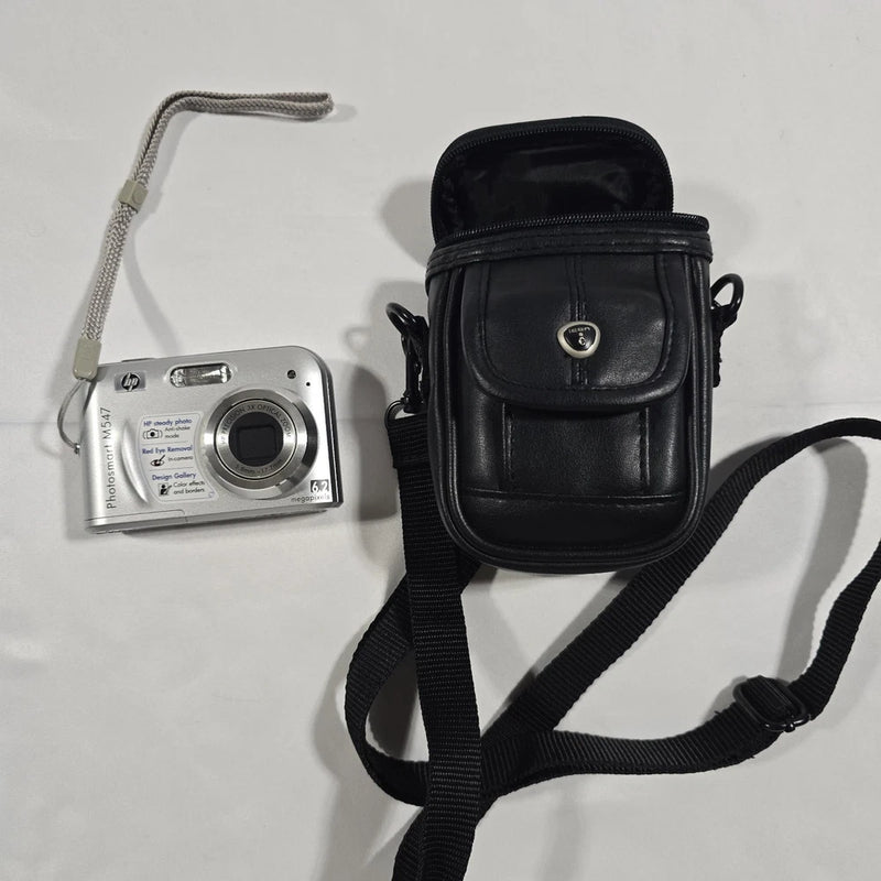 HP PhotoSmart M547 6.2MP Digital Camera - Bonus Case