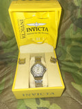 Women's silver-tone bracelet wristwatch with round dial, in open Invicta box