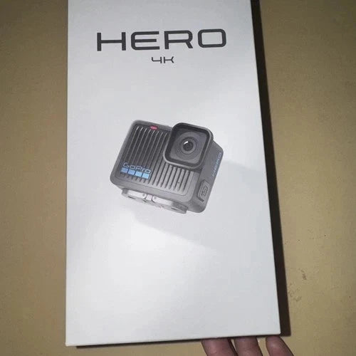 GoPro HERO action camera with front lens and textured body on display box