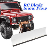 RC snow plow blade with servo, white blade on red off-road truck