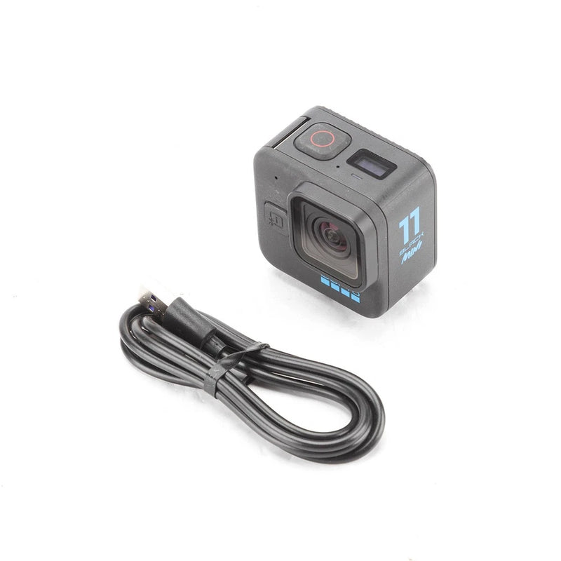 GoPro HERO11 Black mini action camera with charging cable, compact cube design