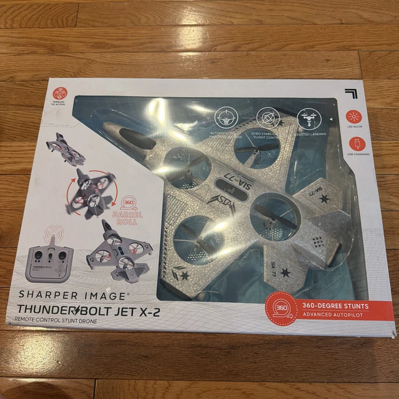 Sharper Image mini drone retail box with remote control jet design and 360° stunts