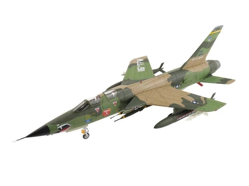 1:72 scale jet aircraft model in green and tan camouflage with landing gear