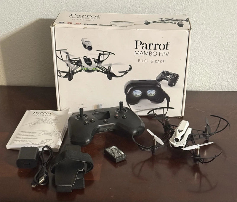 FPV race drone kit with Parrot Mambo controller and headset, plus boxed drone
