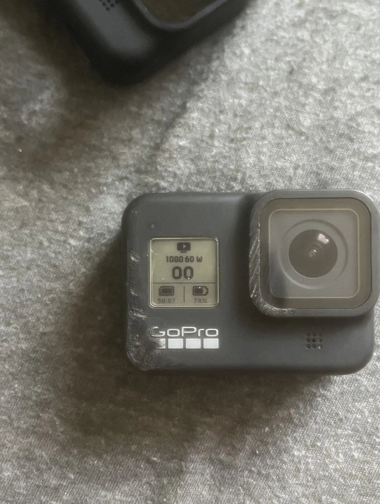 GoPro Hero 8 camera with rear screen and side lens housing, dark gray/black