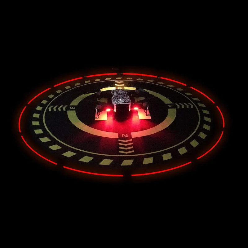 Drone landing pad with red LED light ring and runway pattern